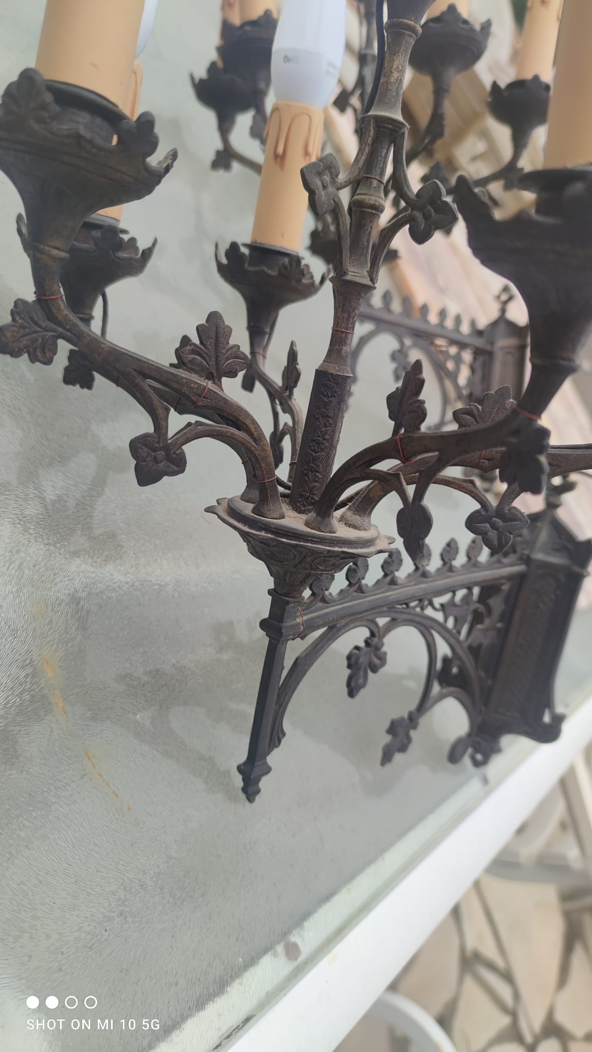 Pair of 19th-century bronze cathedral wall sconces with 5 lights