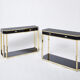 Pair of black lacquered consoles and brass 1970