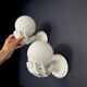 Pair of Pop Art "Globes on hands" ceramic wall lights - 1980.