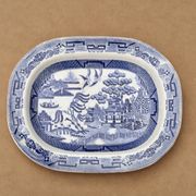 Large oval dish in blue and white English earthenware with Asian decoration, 19th century.