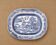 Large oval dish in blue and white English earthenware with Asian decoration, 19th century.