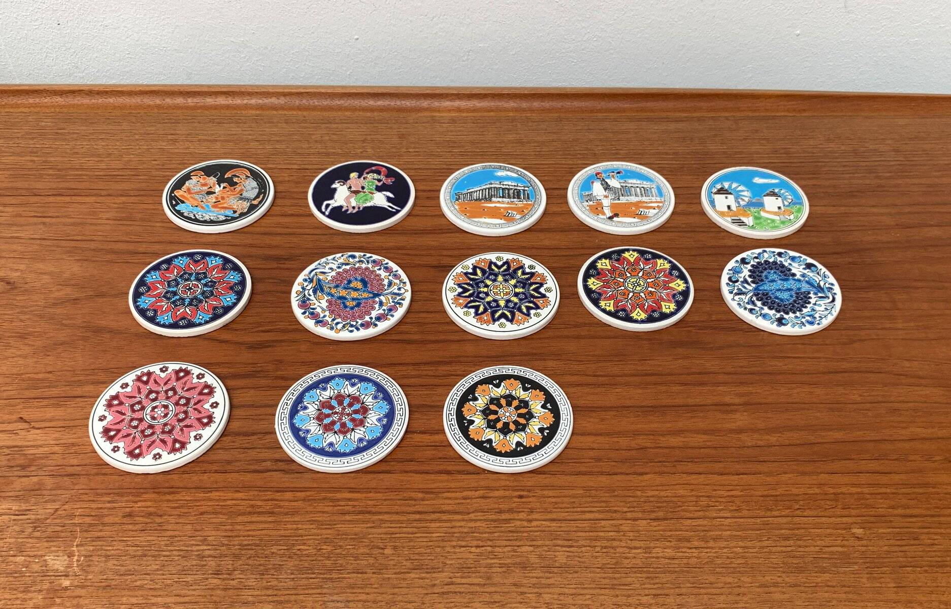 Set of 13 vintage ceramic coasters handmade by Lito Niarchos.