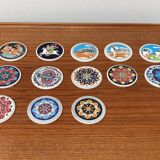 Set of 13 vintage ceramic coasters handmade by Lito Niarchos.