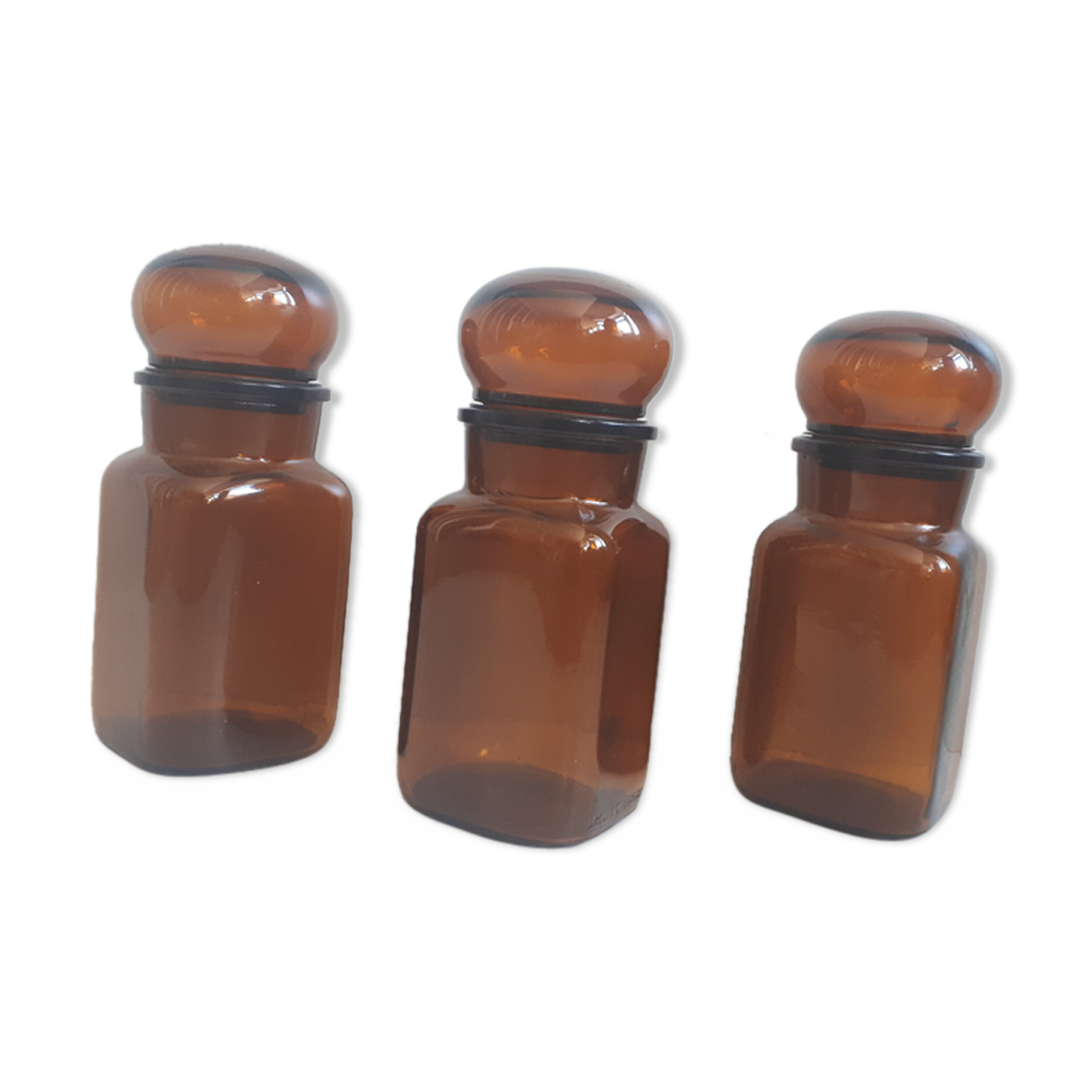 Trio round brown apothecary bottles