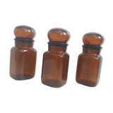 Trio round brown apothecary bottles