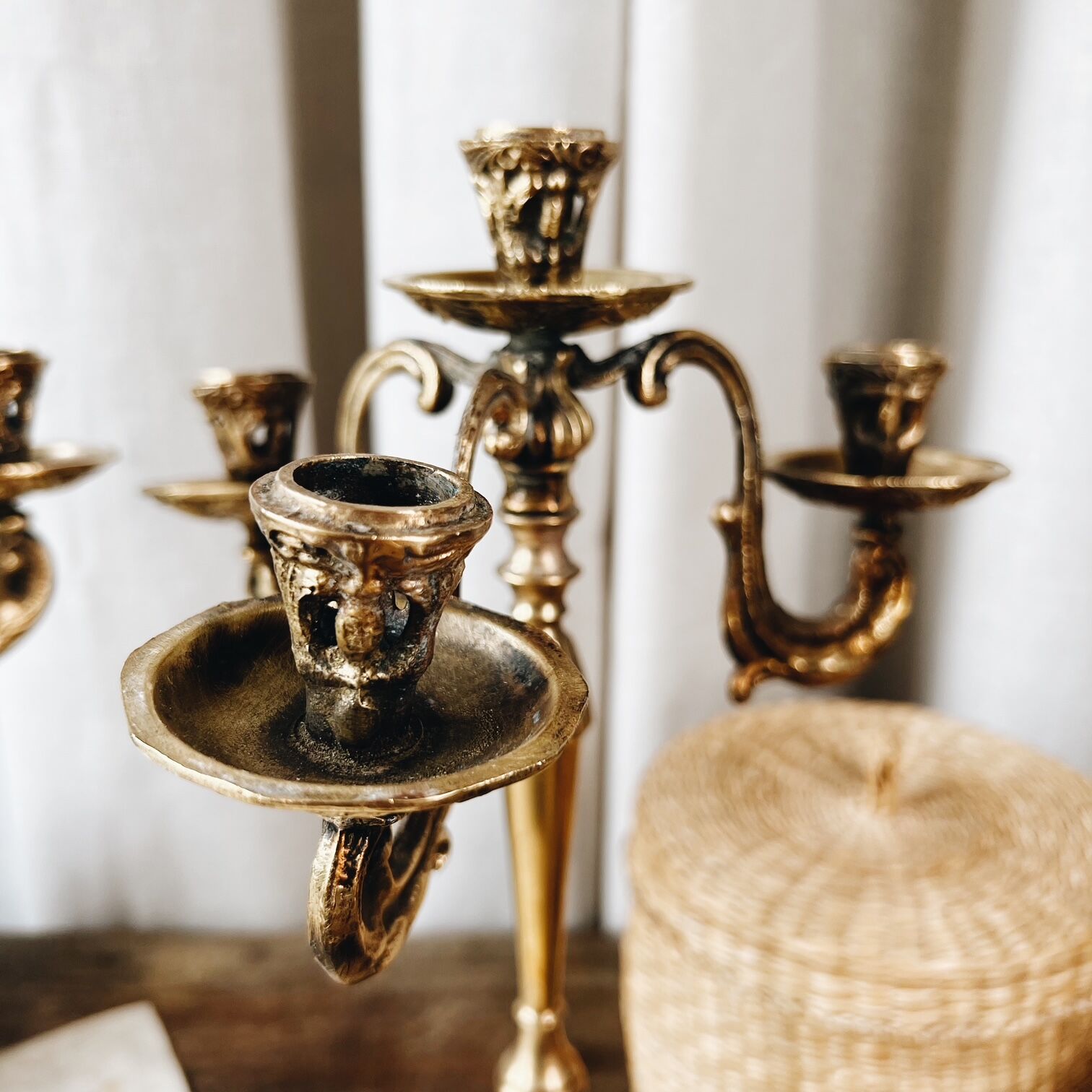 Duo of antique bronze chandeliers