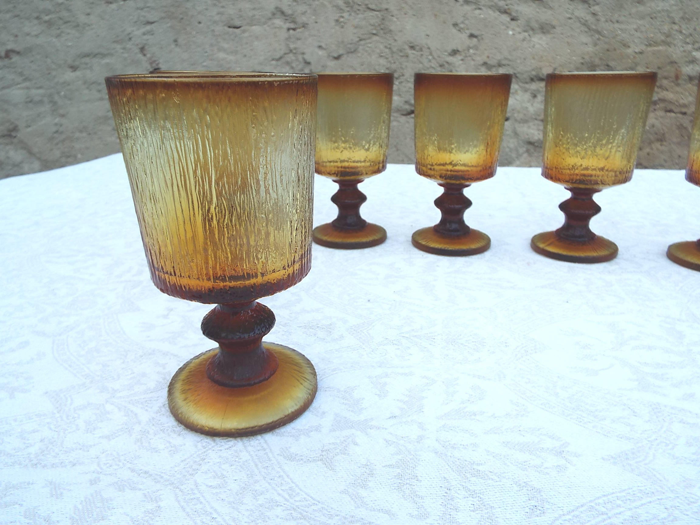 8 amber stemmed glasses