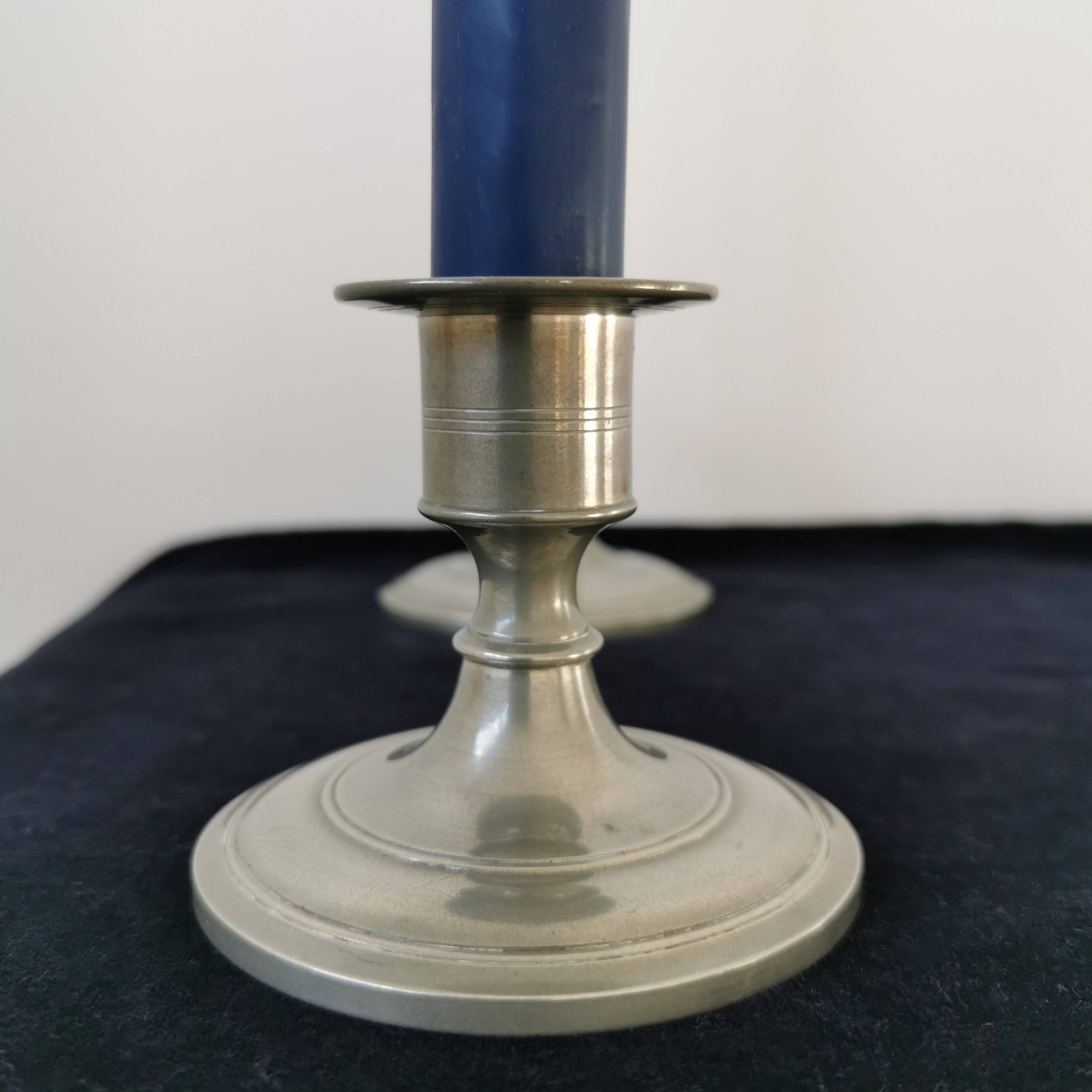 Pair of pewter candlesticks
