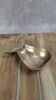 Small vintage brass trinket dish in the shape of a pear.