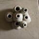 Beige ceramic flower pick