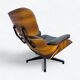Fauteuil et repose-pieds Herman Miller Original Eames, marron et noyer