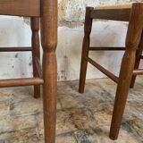 Pair of 20th century wooden stools with straw seats