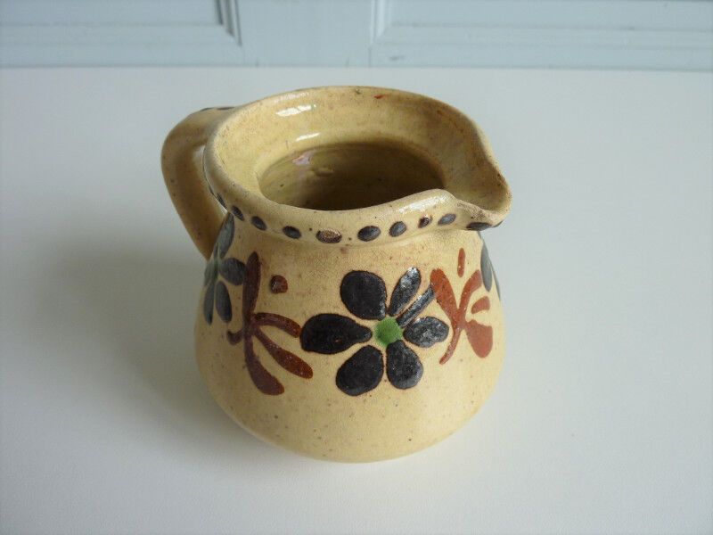 Ancient ceramic milk pot