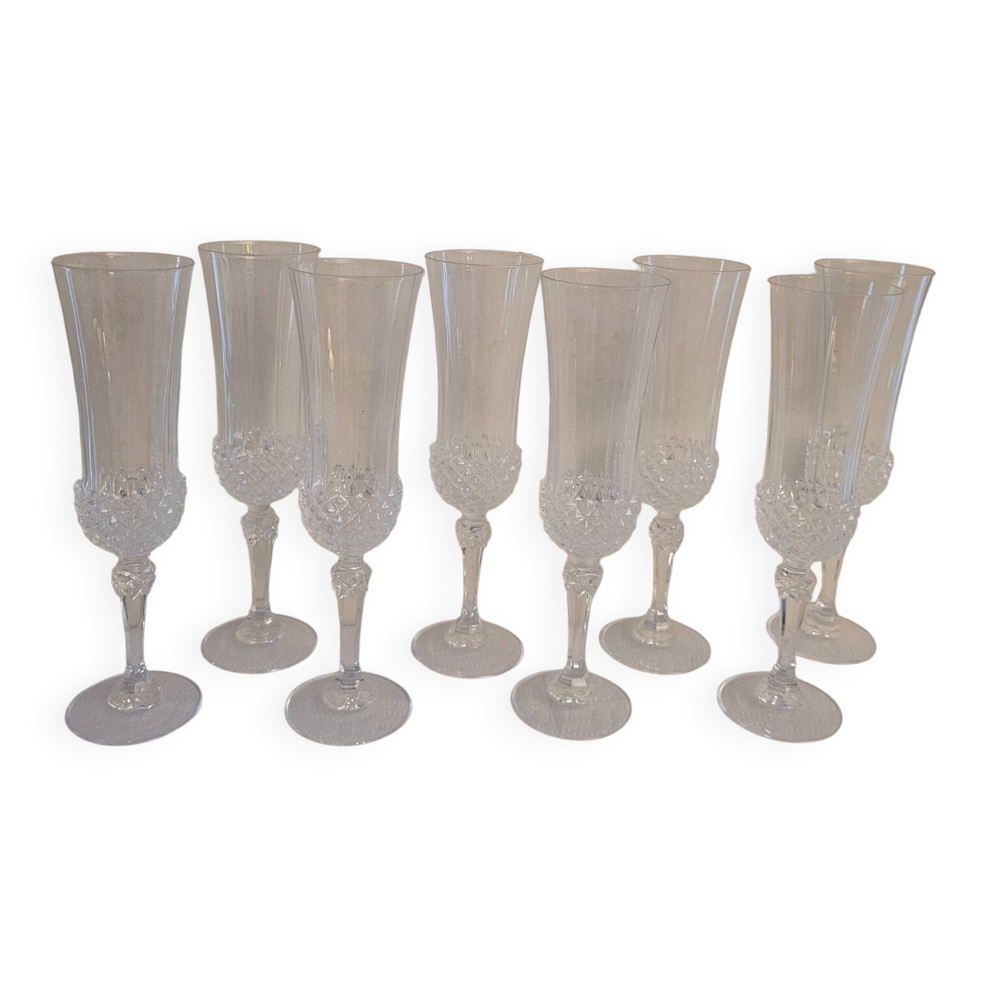 Set of 8 cut crystal flutes from the 70s-80s.