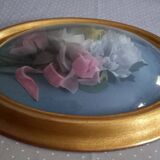 Silk flower frame under curved glass