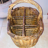 Wicker and hazel bottle basket from the early 20th century or possibly earlier.