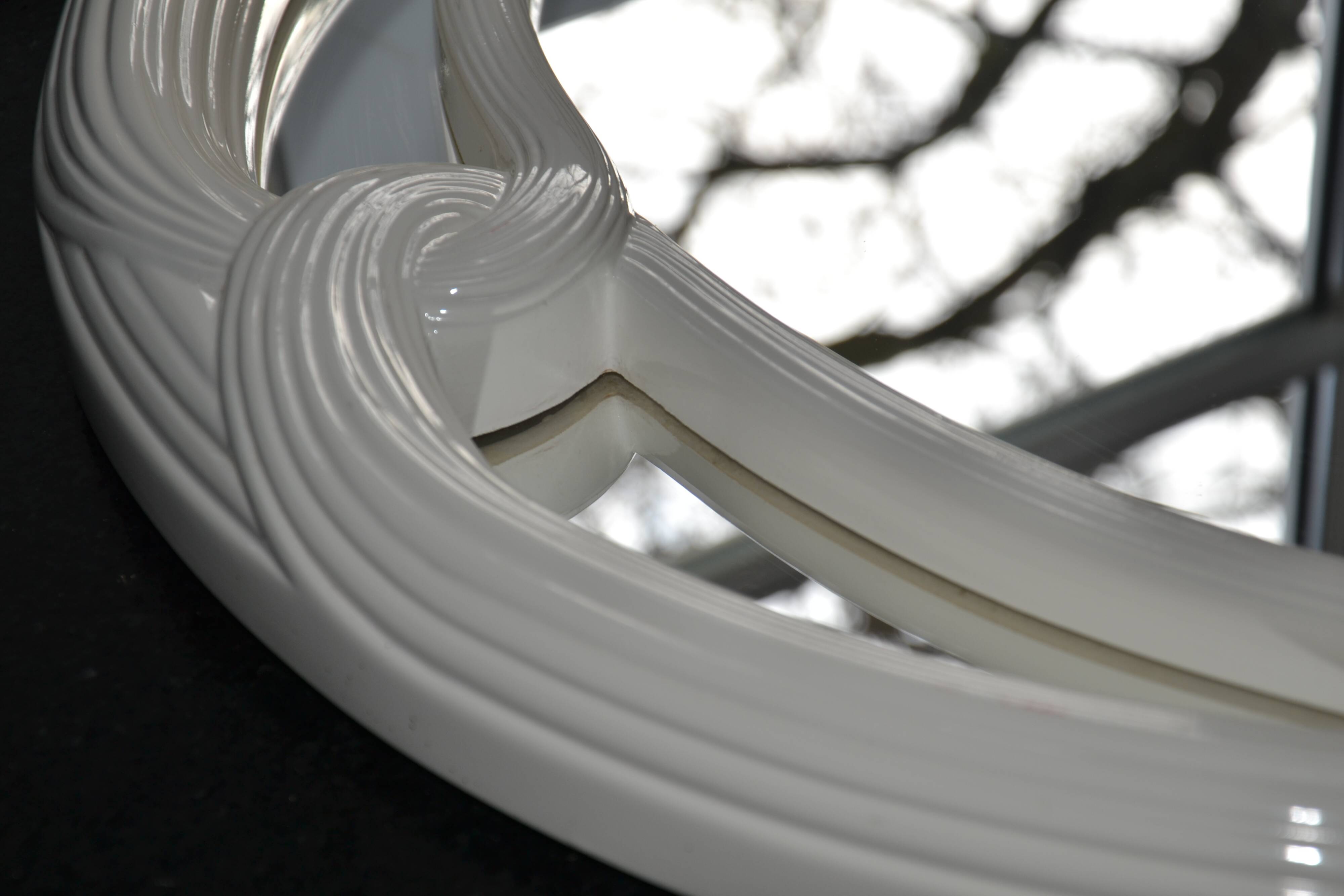 White mirror in 90s Art Deco style