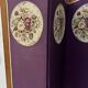 Four-panel screen decorated with an oval tapestry from the 20th century.