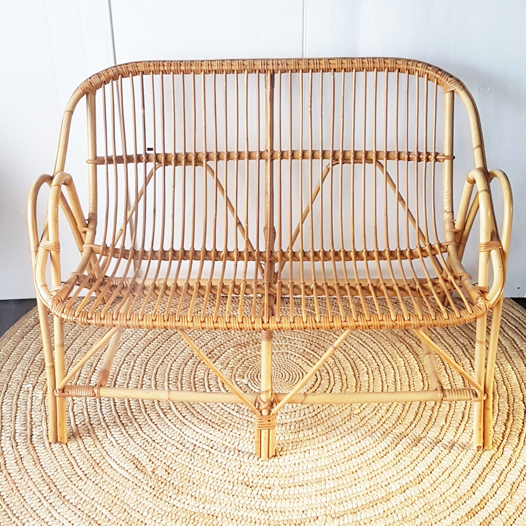 Bench into rattan 2 seater of the sixties