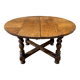 Antique oak round table with extensions, beautifully made from the years.