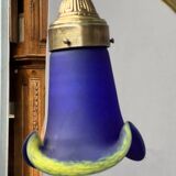 Solid bronze Art Deco style chandelier with iconic handmade lampshades.
