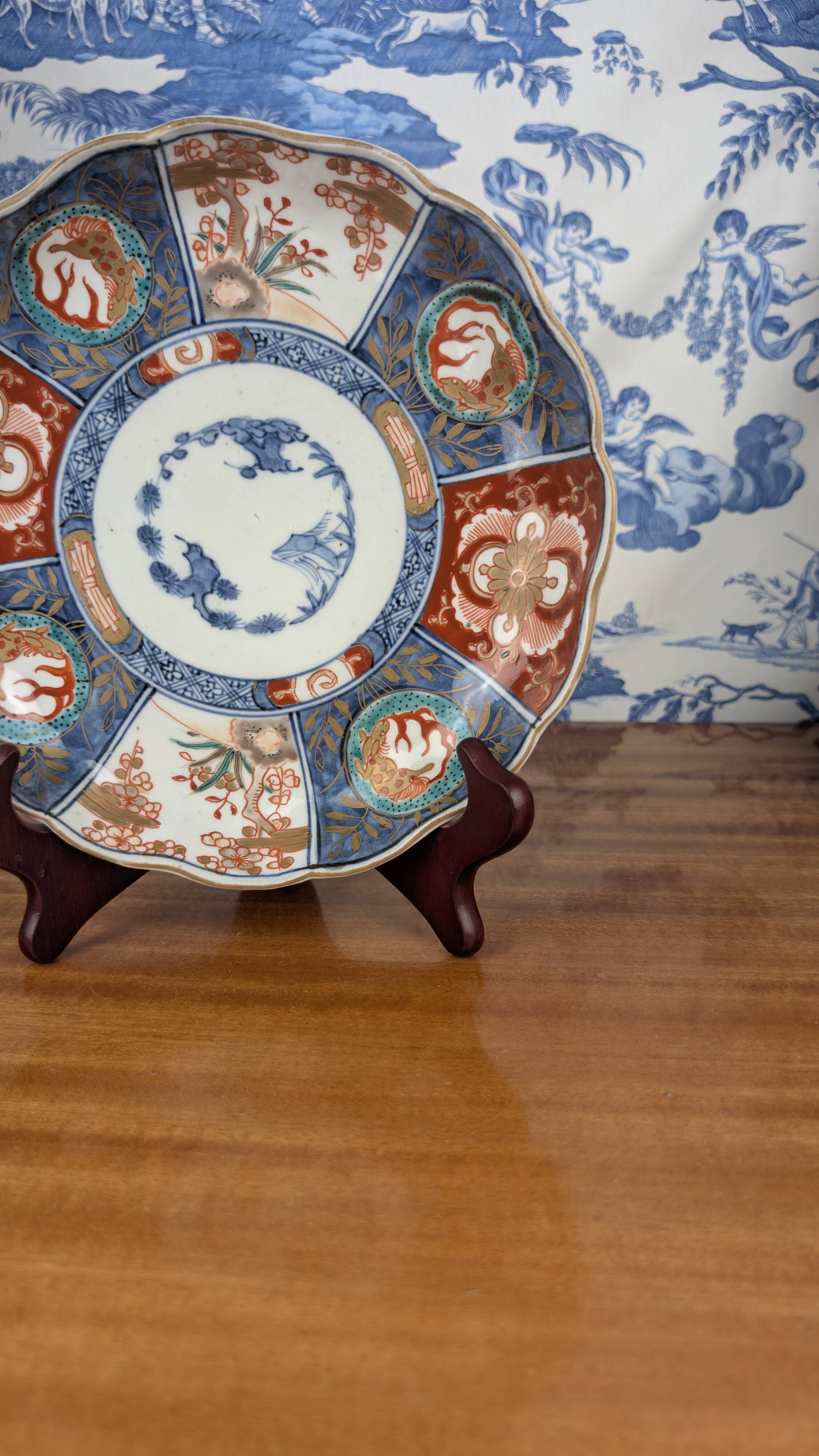 Signed Imari porcelain plate with Japanese lake and deer decoration, 19th century