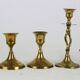 Trio of brass candle holders, vintage