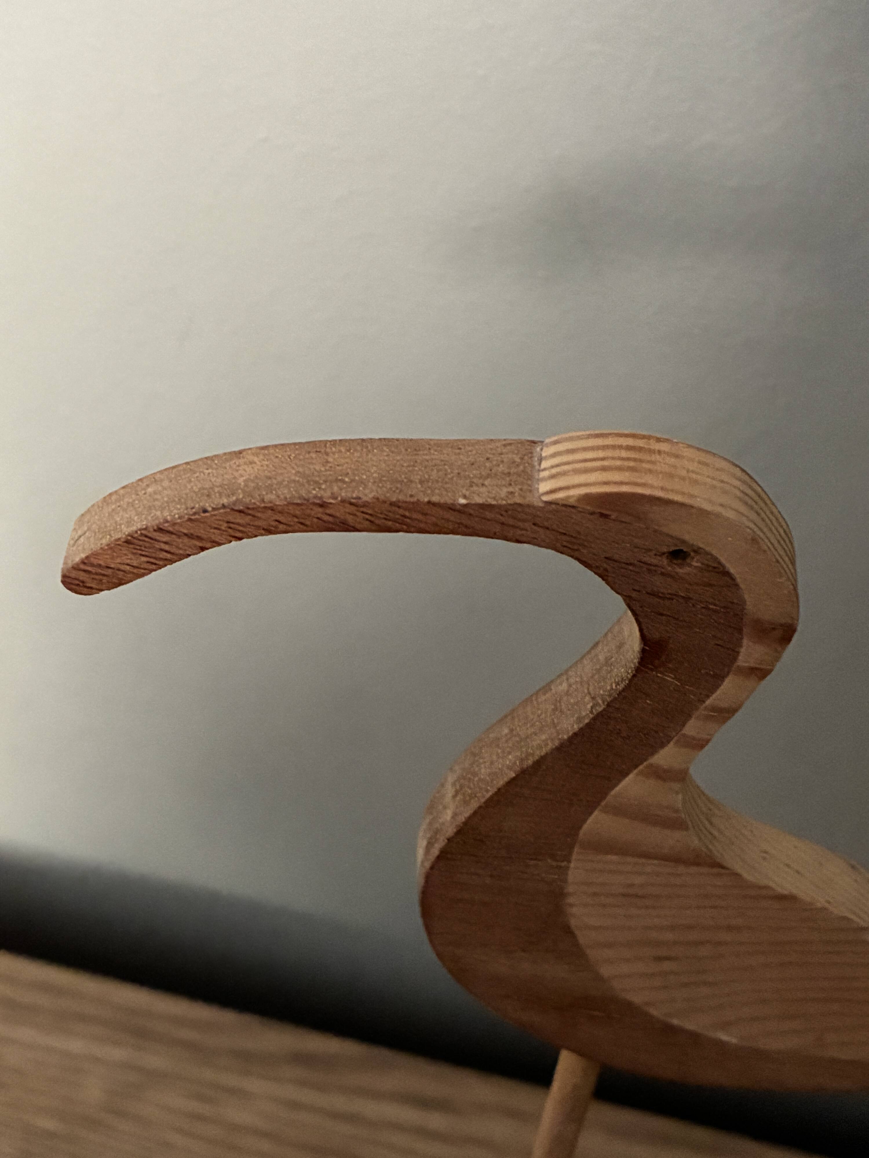Wooden wading bird on a base