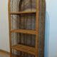 Round rattan shelf