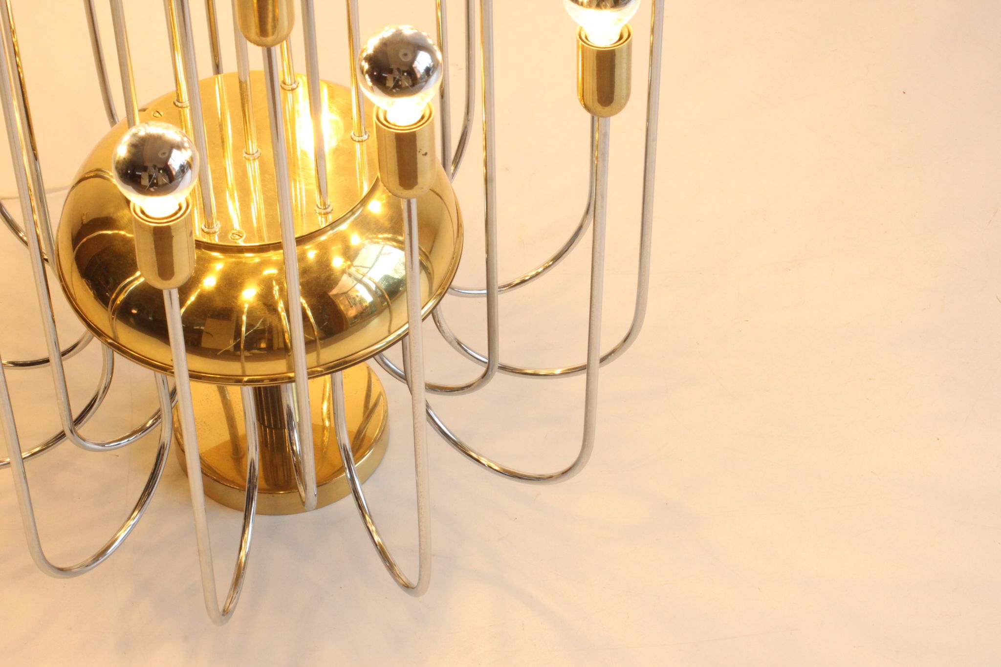 Tubular chrome and brass waterfall chandelier, Italy 1970s.