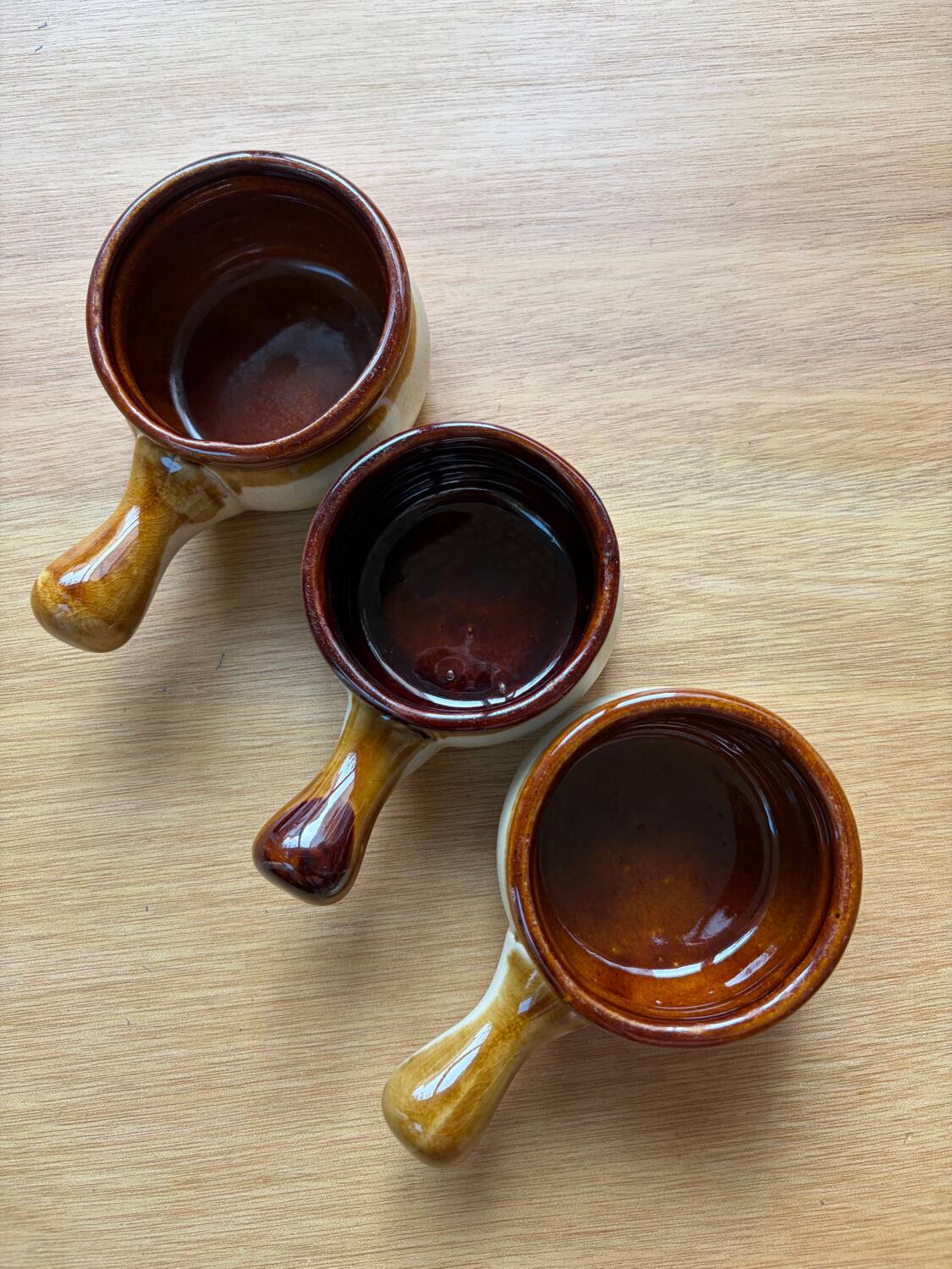 Set of 3 small glazed stoneware ramekins.
