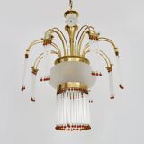 Art Nouveau style chandelier in brass with pendants and glass globe with 3 lights. Italy 70s 80s