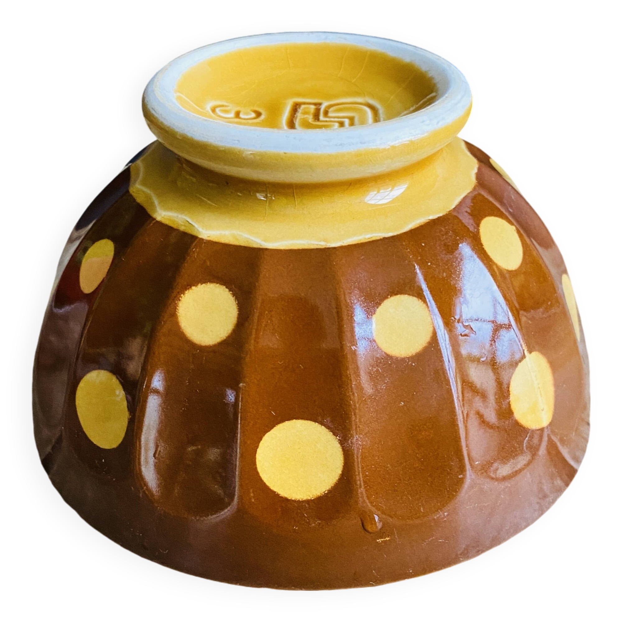 Old faceted bowl with polka dot pattern from the Sarreguemines earthenware factory