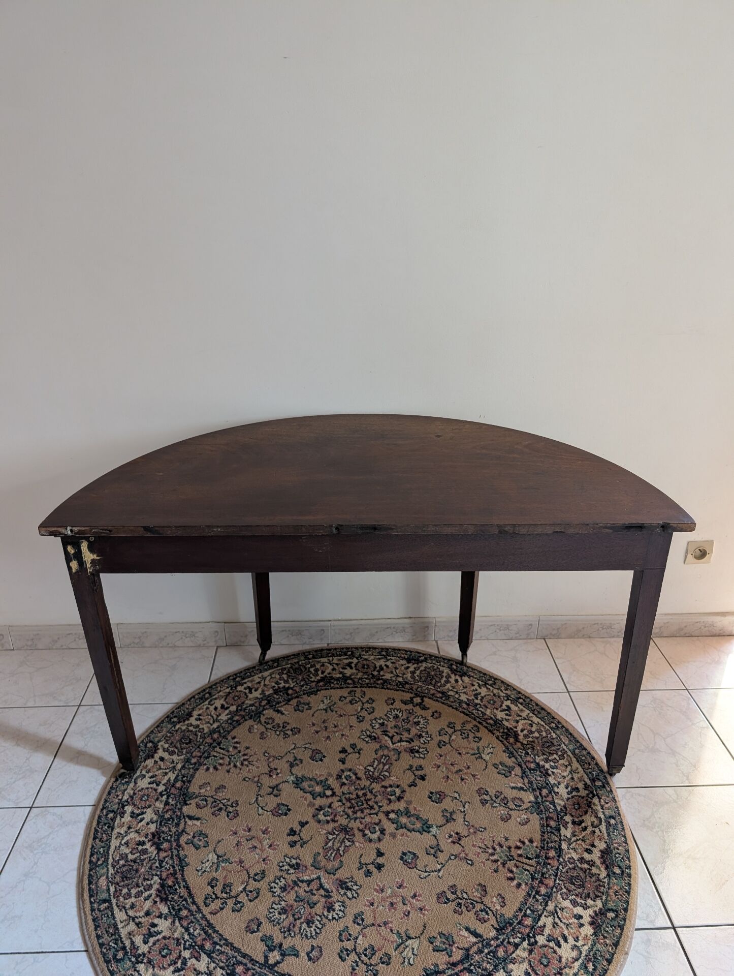 Old half-moon table or serving trolley on wheels
