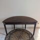 Old half-moon table or serving trolley on wheels