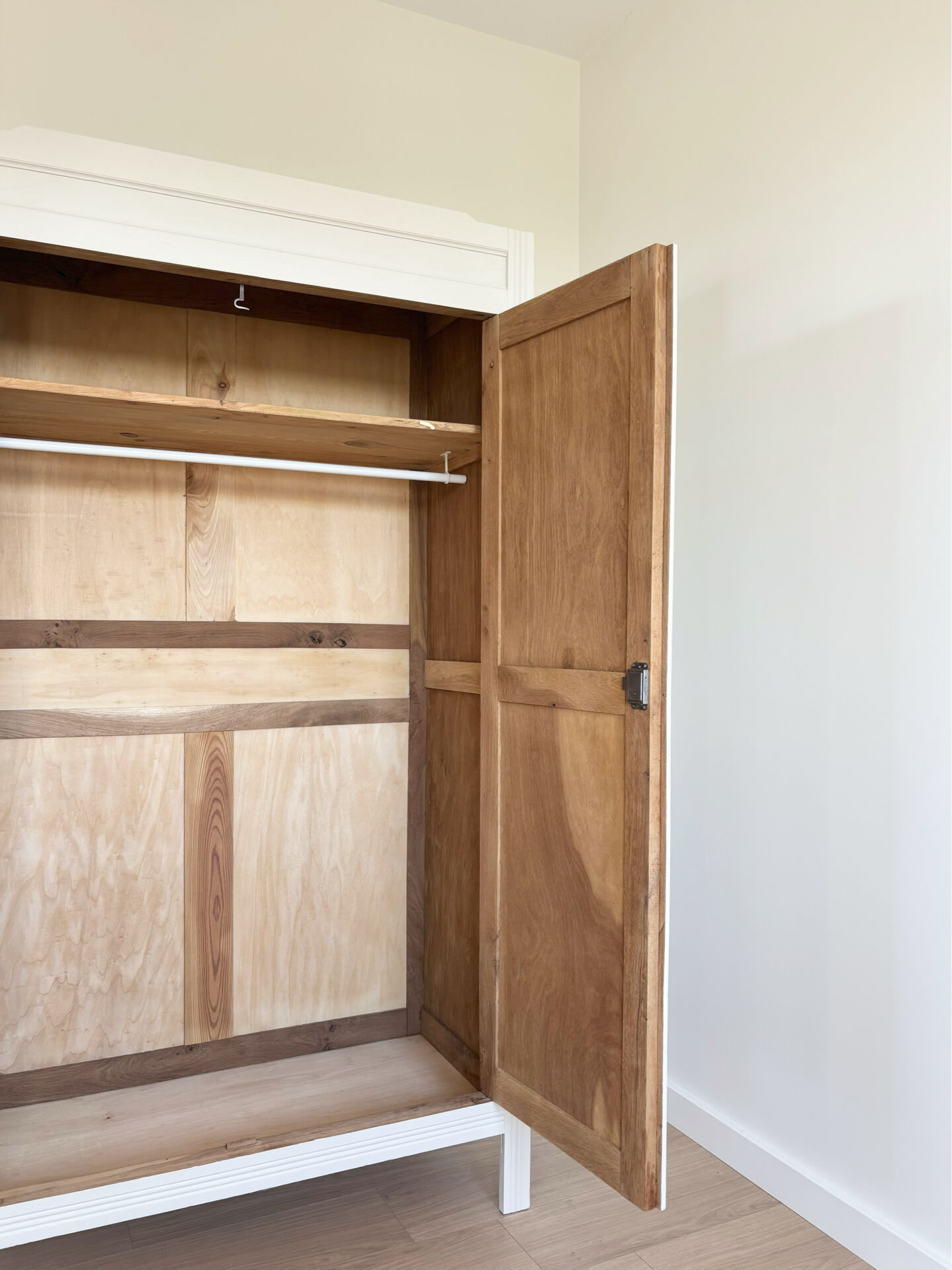 Large Parisian wardrobe in renovated oak wood.