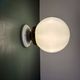 Vintage globe wall or ceiling light in white opaline.