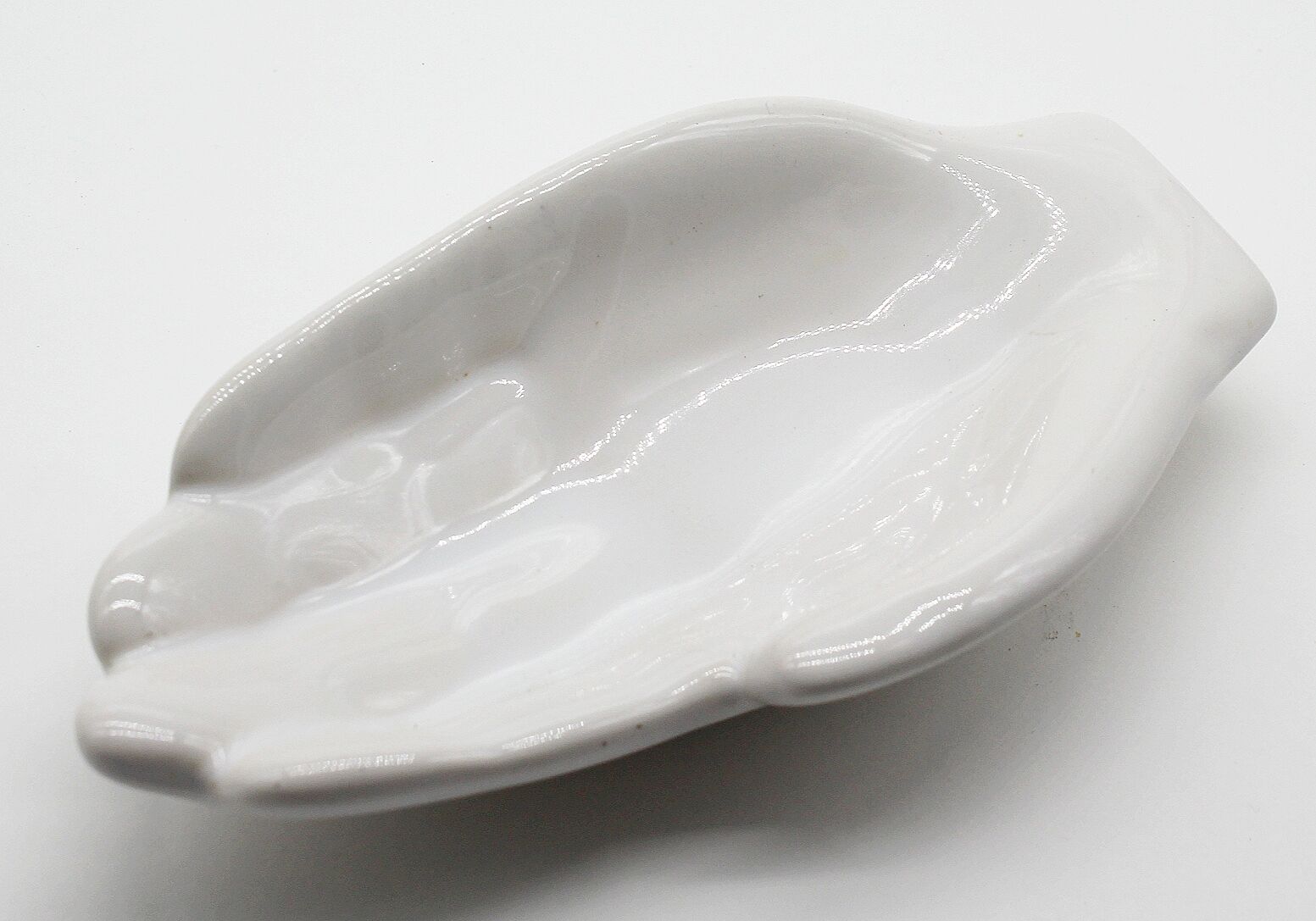 Empty white ceramic hand pocket