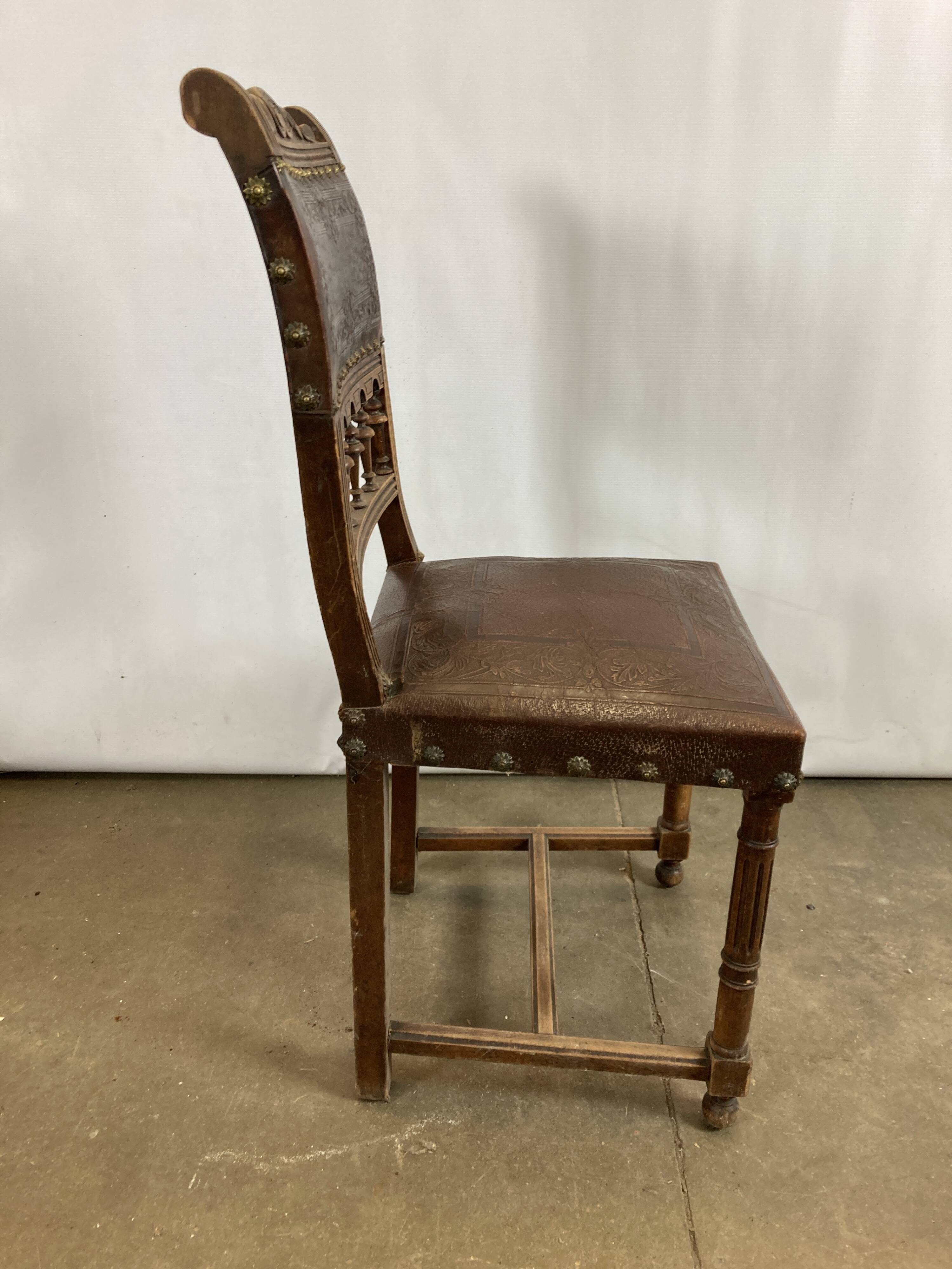 Pair of Henry II wooden and leather chairs