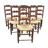 Six old straw chairs