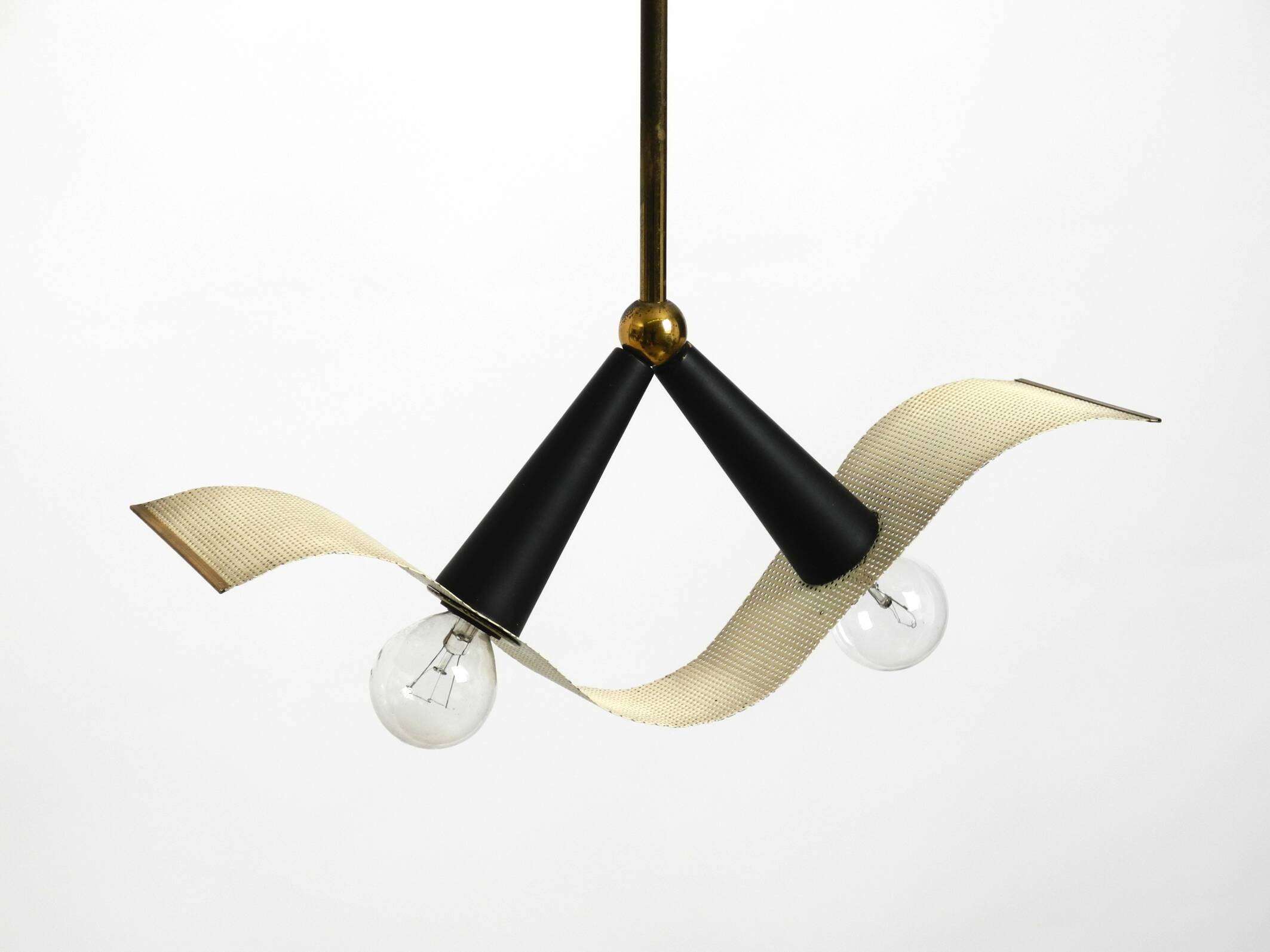 Mid Century brass ceiling lamp with a curved perforated sheet lampshade