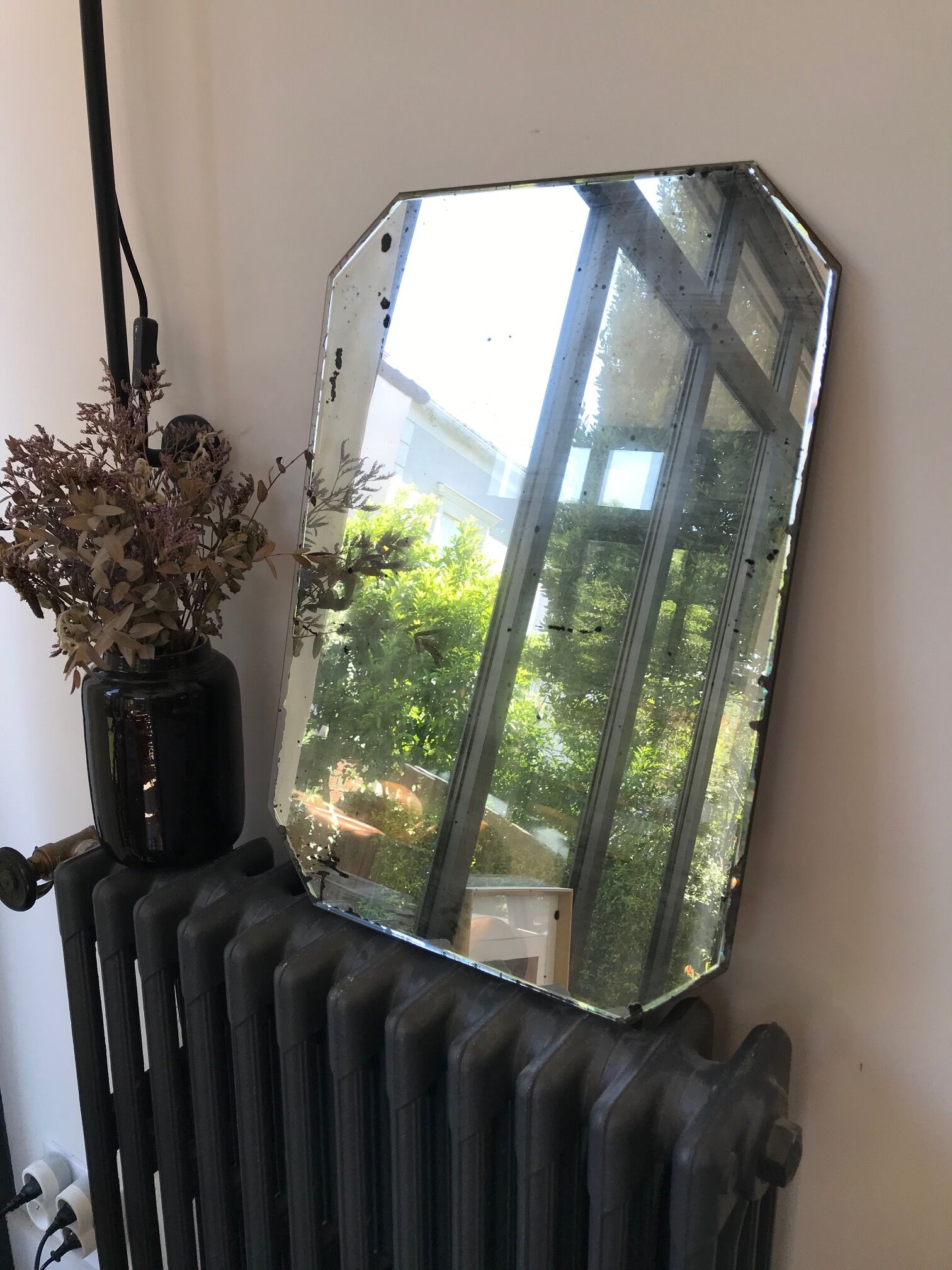 Old octagonal beveled mirror