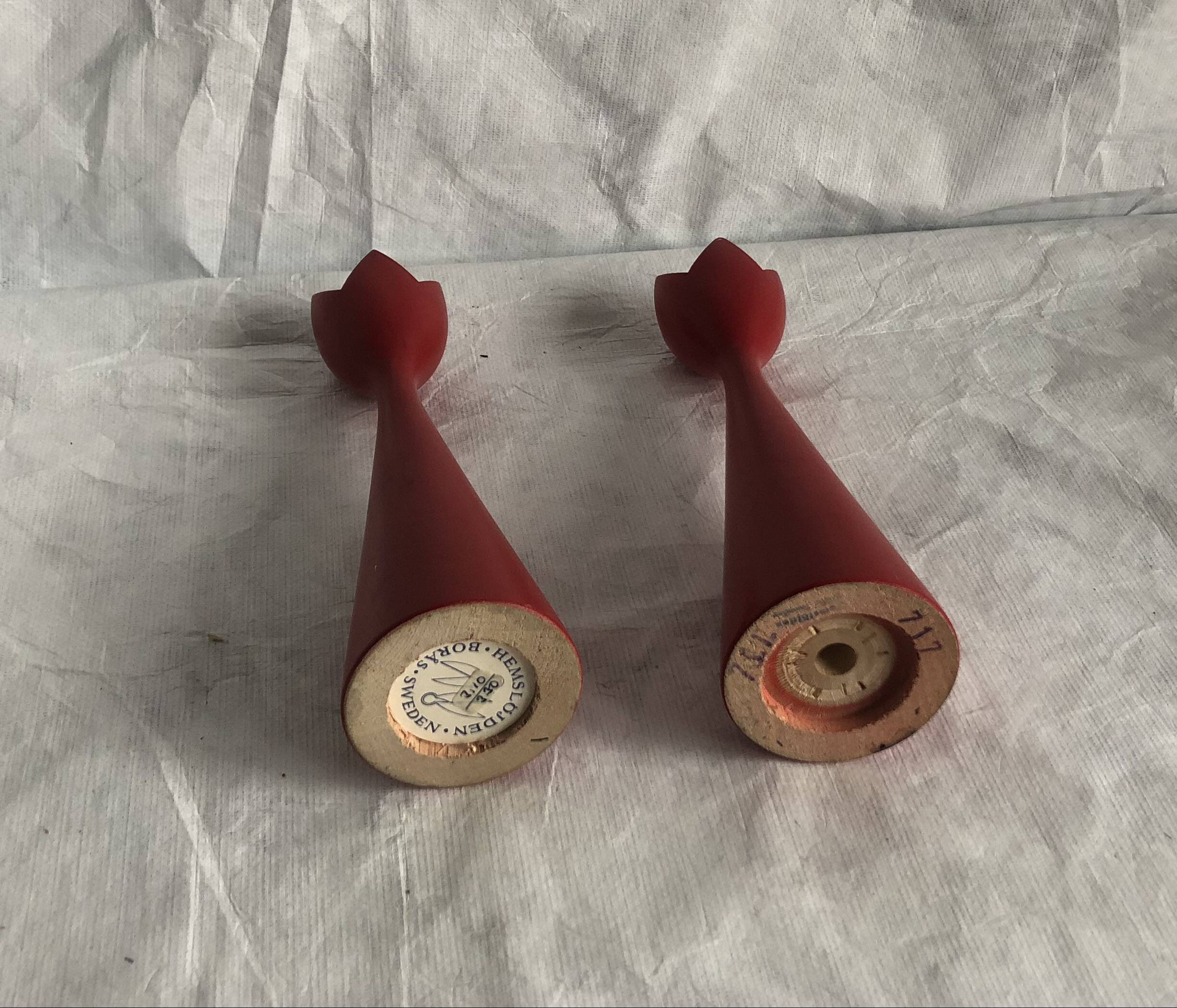 pair of Scandinavian painted wooden candle holders, minimalist atmosphere, free form