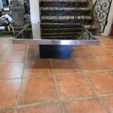 Chrome coffee table with smoked mirror top