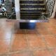 Chrome coffee table with smoked mirror top
