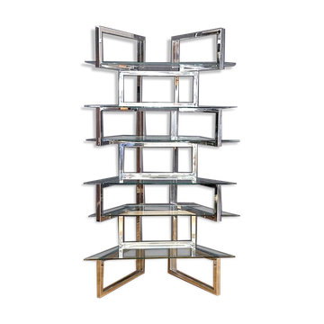 Articulated display shelf in chrome and glass. Italy 1970.