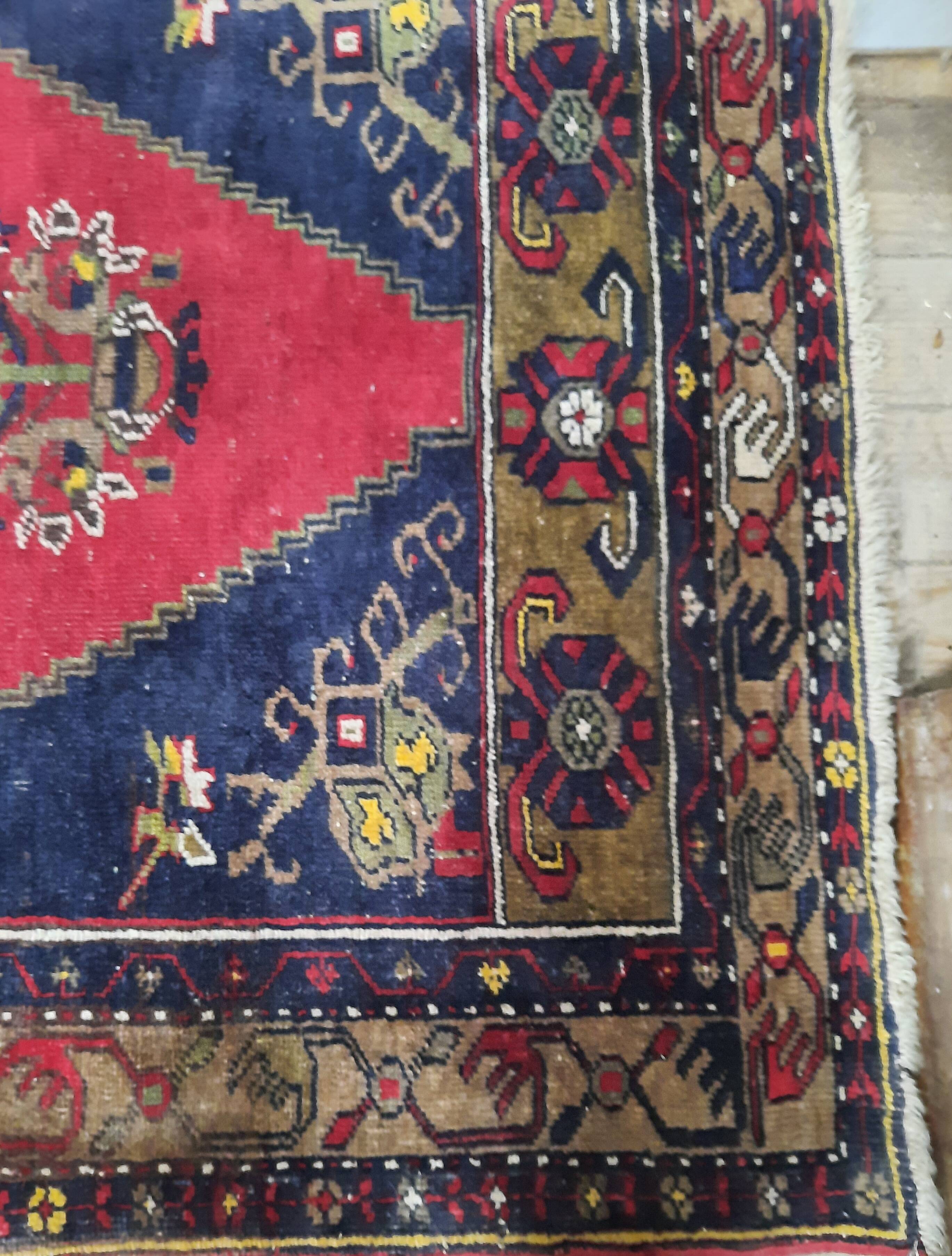 Handmade blue and red rug