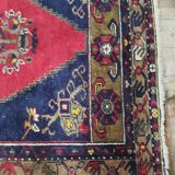 Tapis fait main bleu et rouge