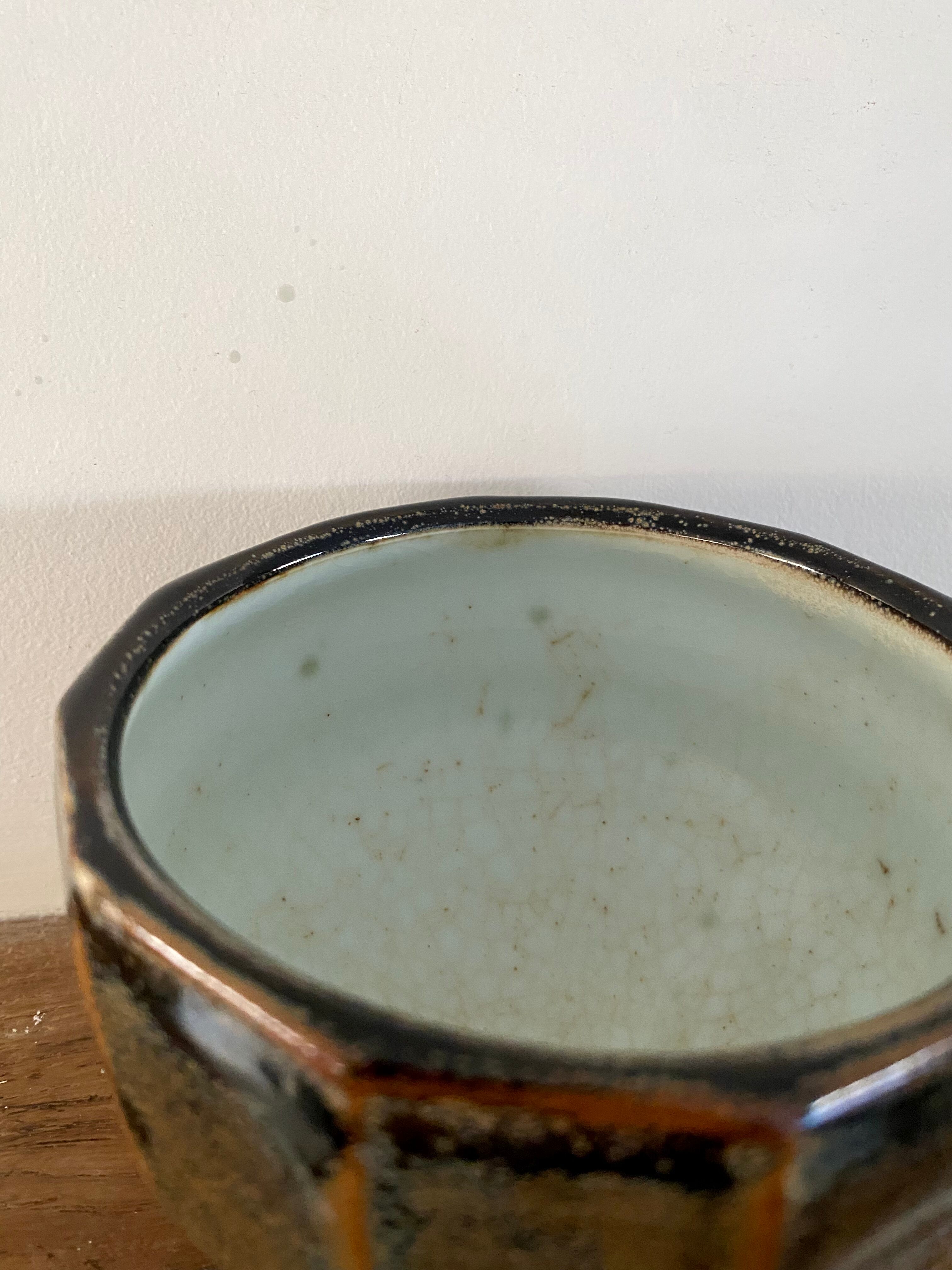 Glazed ceramic bowl signed