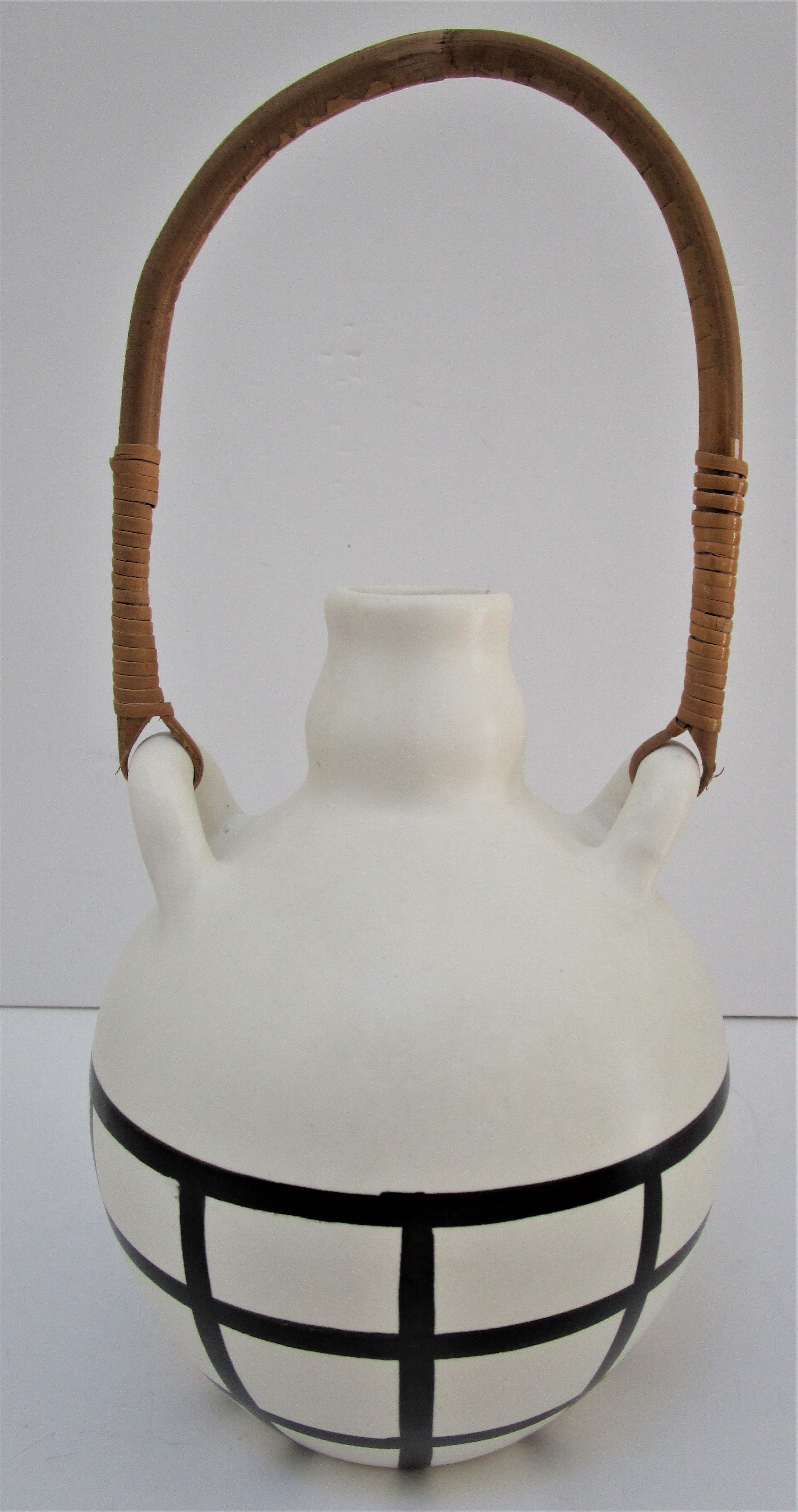 pineau bottle and ceramic cup by Lili Voltz 60s